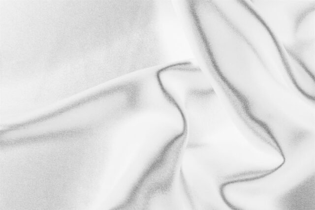 Tissu Uni Satin stretch Blanc optique en Soie, Stretch pour Chemise, Lingerie, Robe, Robe de cérémonie, Robe de soirée.